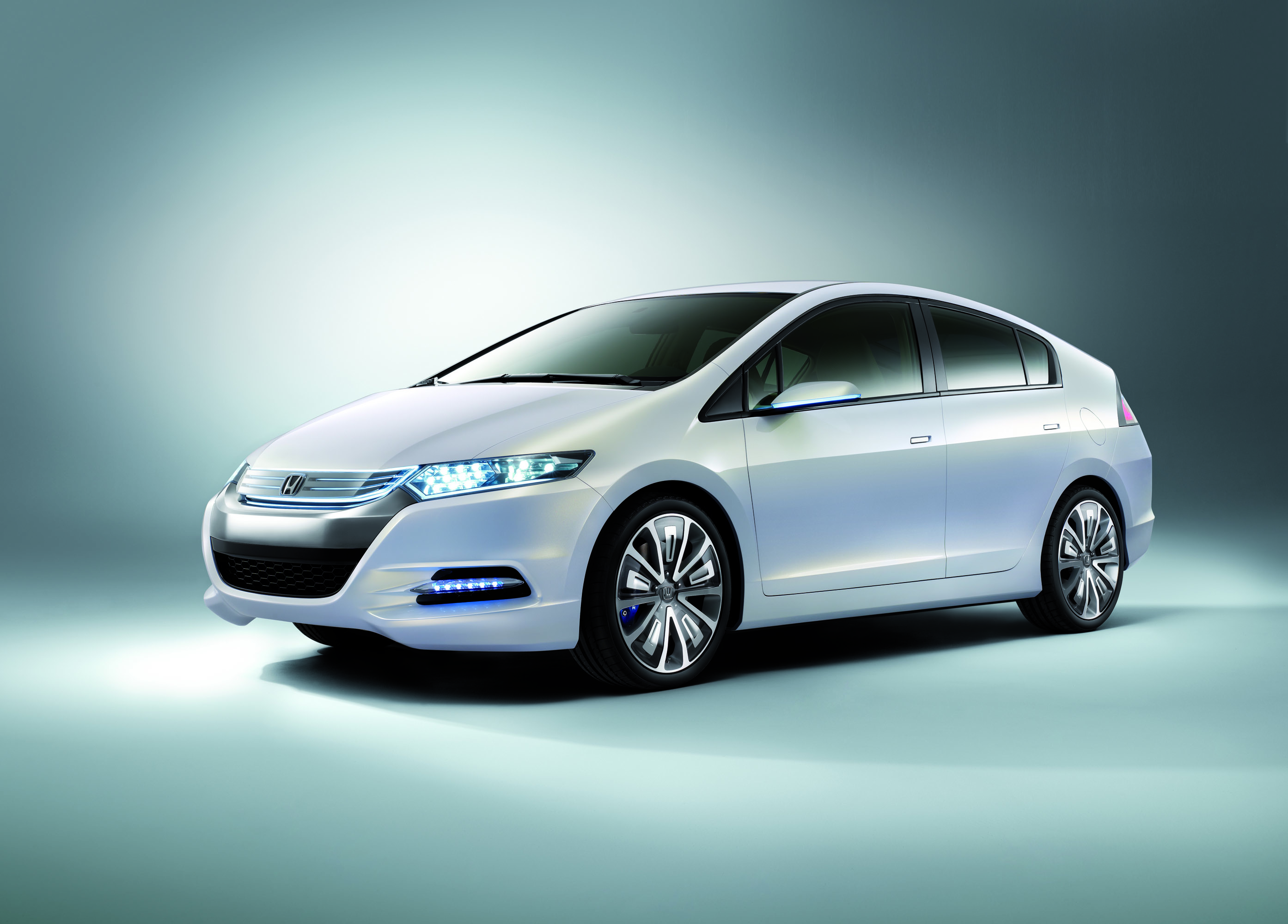 Хонда гибрид автомобиля. Honda Insight Hybrid 2009. Хонда Инсайт гибрид. Honda Insight 2008. Honda Insight Concept 2008.