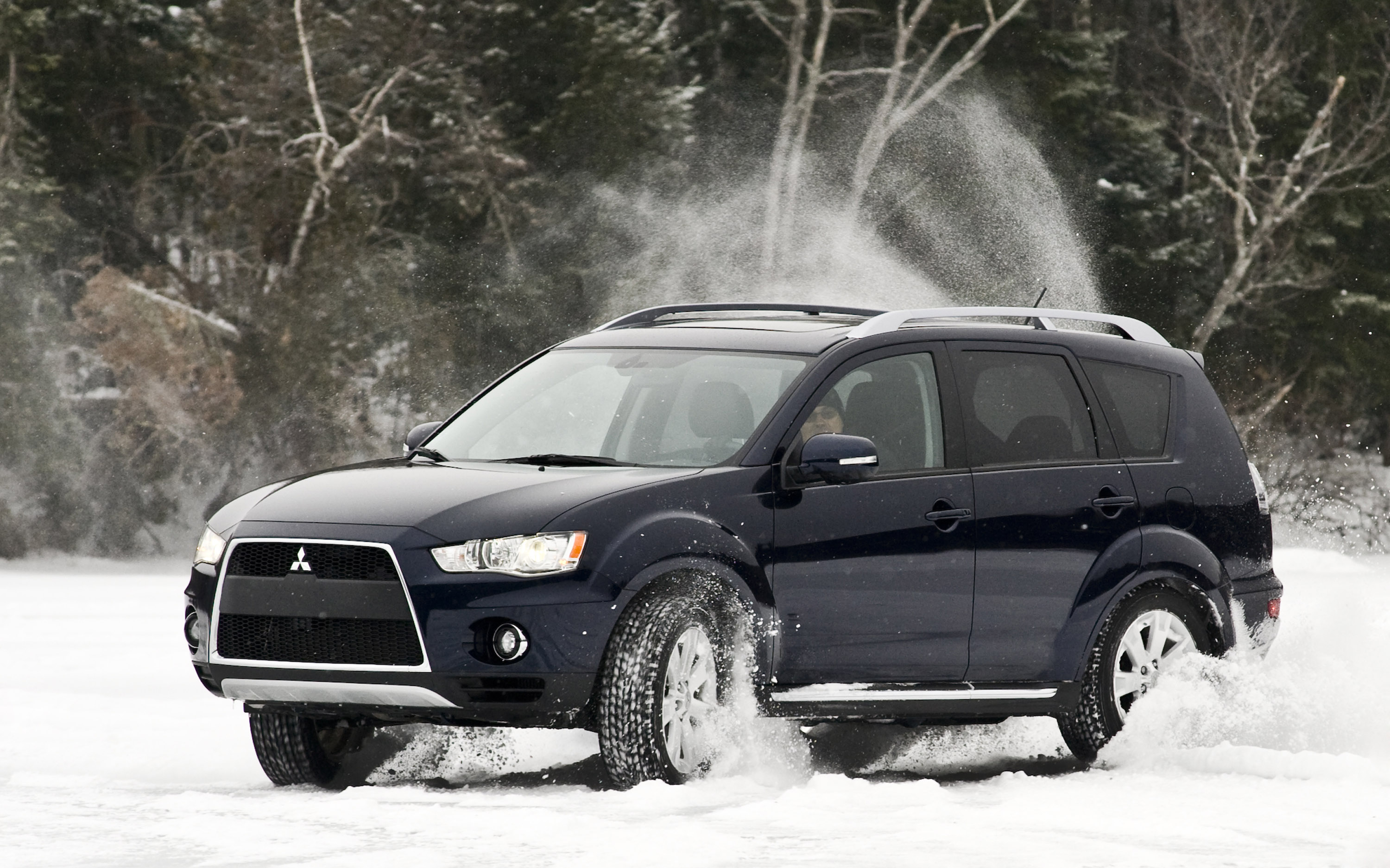 Аутлендер хл. Митсубиси Аутлендер XL. Mitsubishi Outlander XL 2.0. Внедорожники Митсубиси Аутлендер. Mitsubishi Outlander XL 2010.