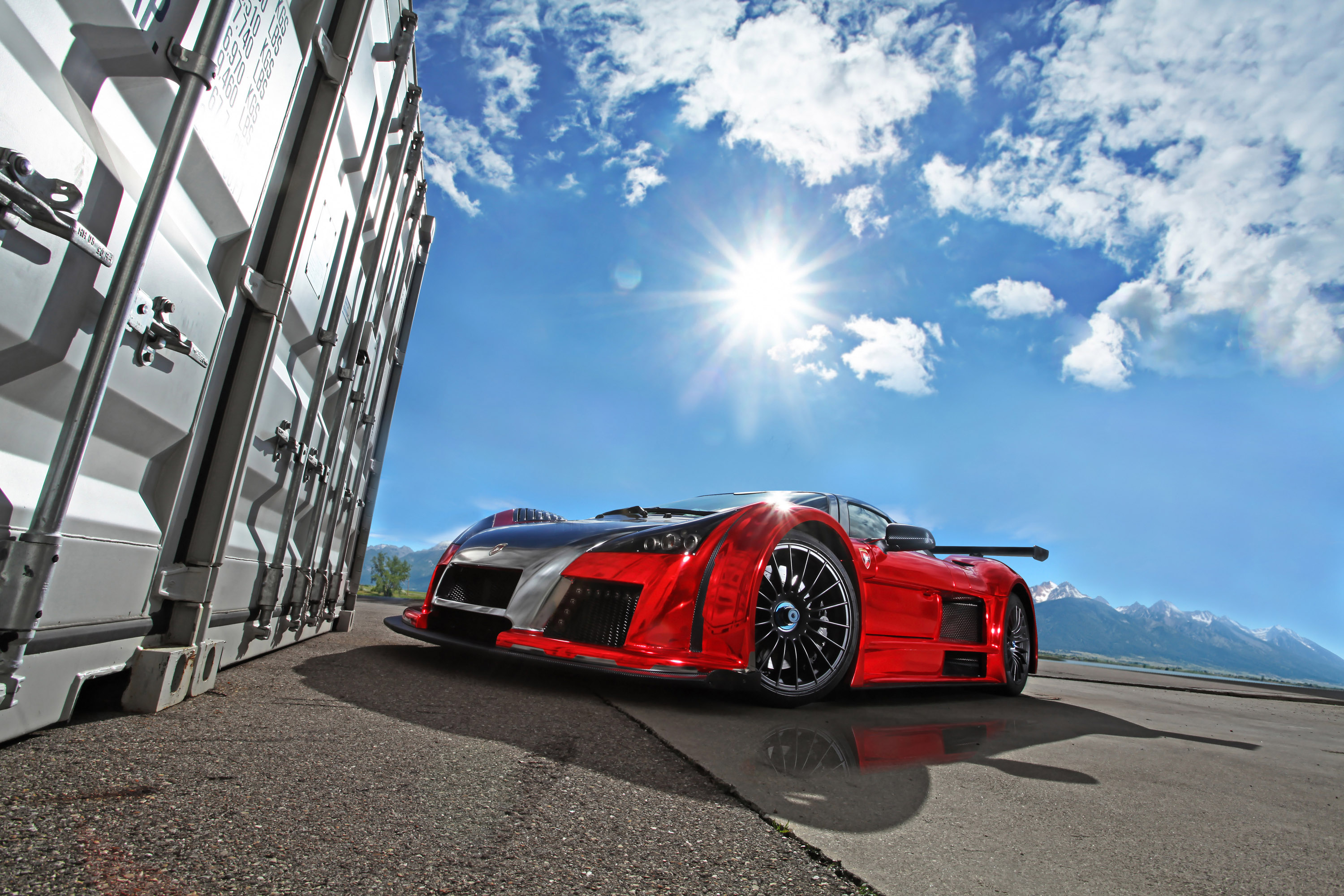 синий спортивный автомобиль Gumpert Apollo бесплатно