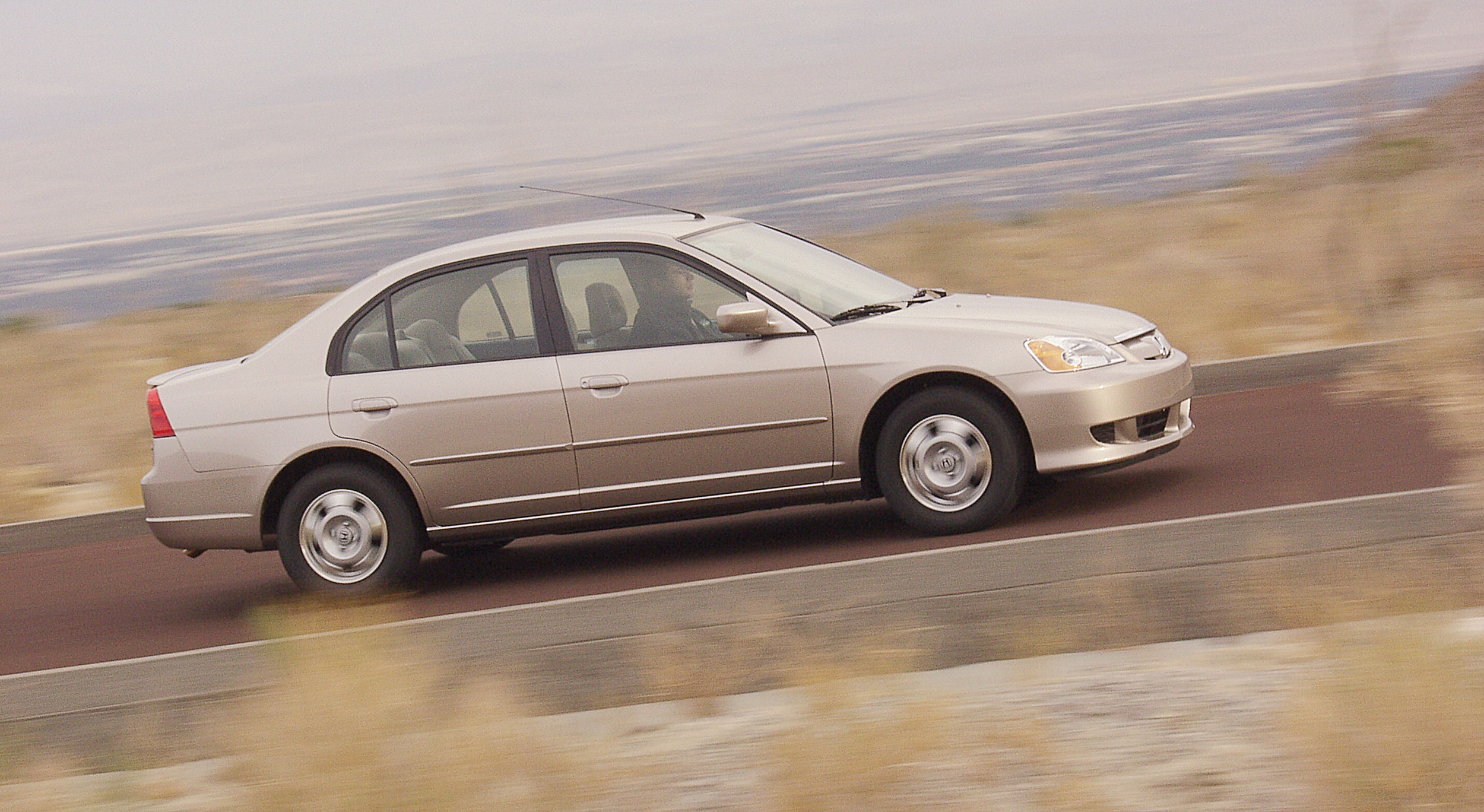 Honda civic 2003. Хонда Цивик 2003 седан. Хонда Цивик 2003 год седан. Civic 2003 Hybrid.