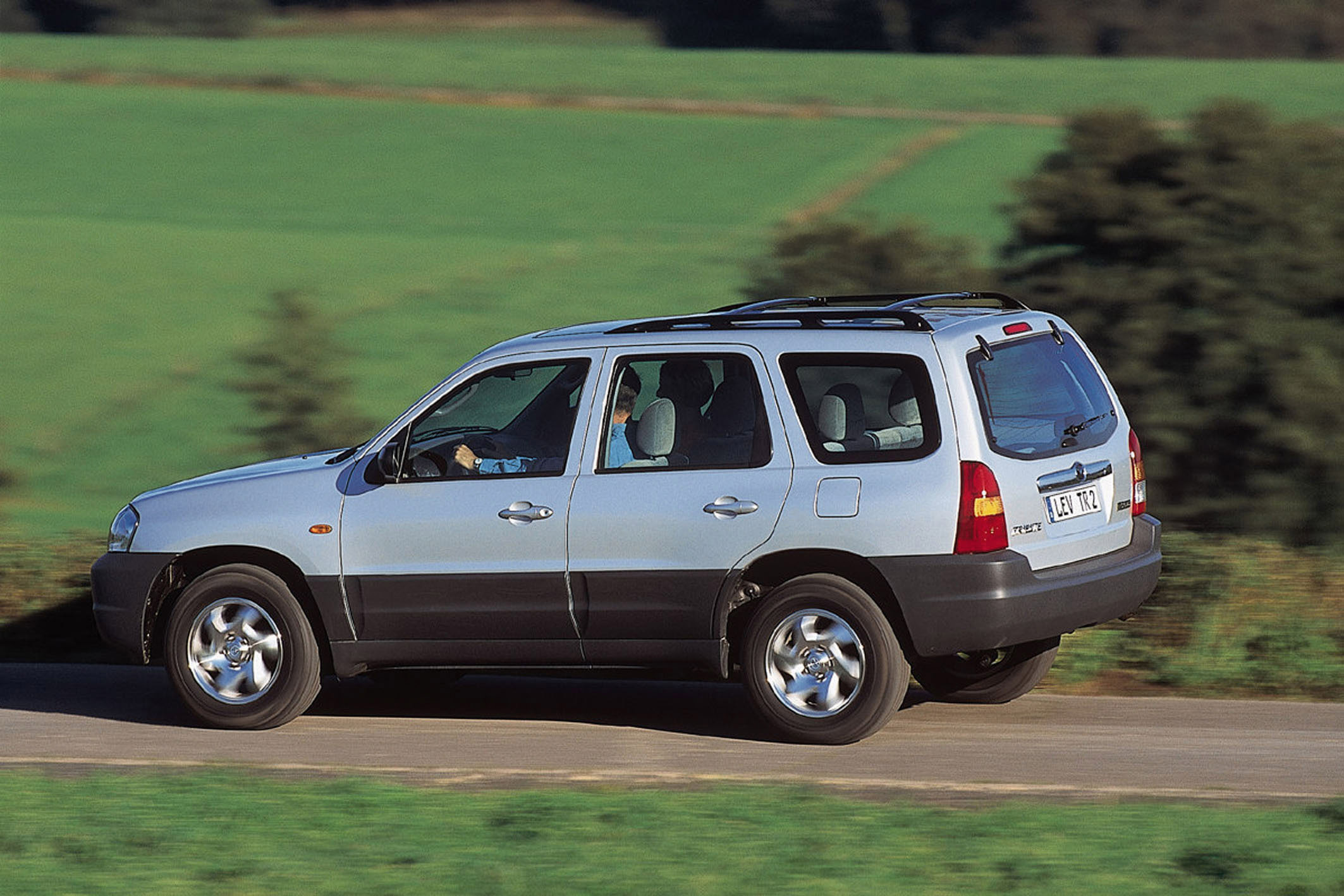 Мазда трибьют 2.0 купить. Мазда трибьют 2001. Mazda Tribute 2003. Мазда Tribute 2001. Mazda Tribute 2.0 2000.