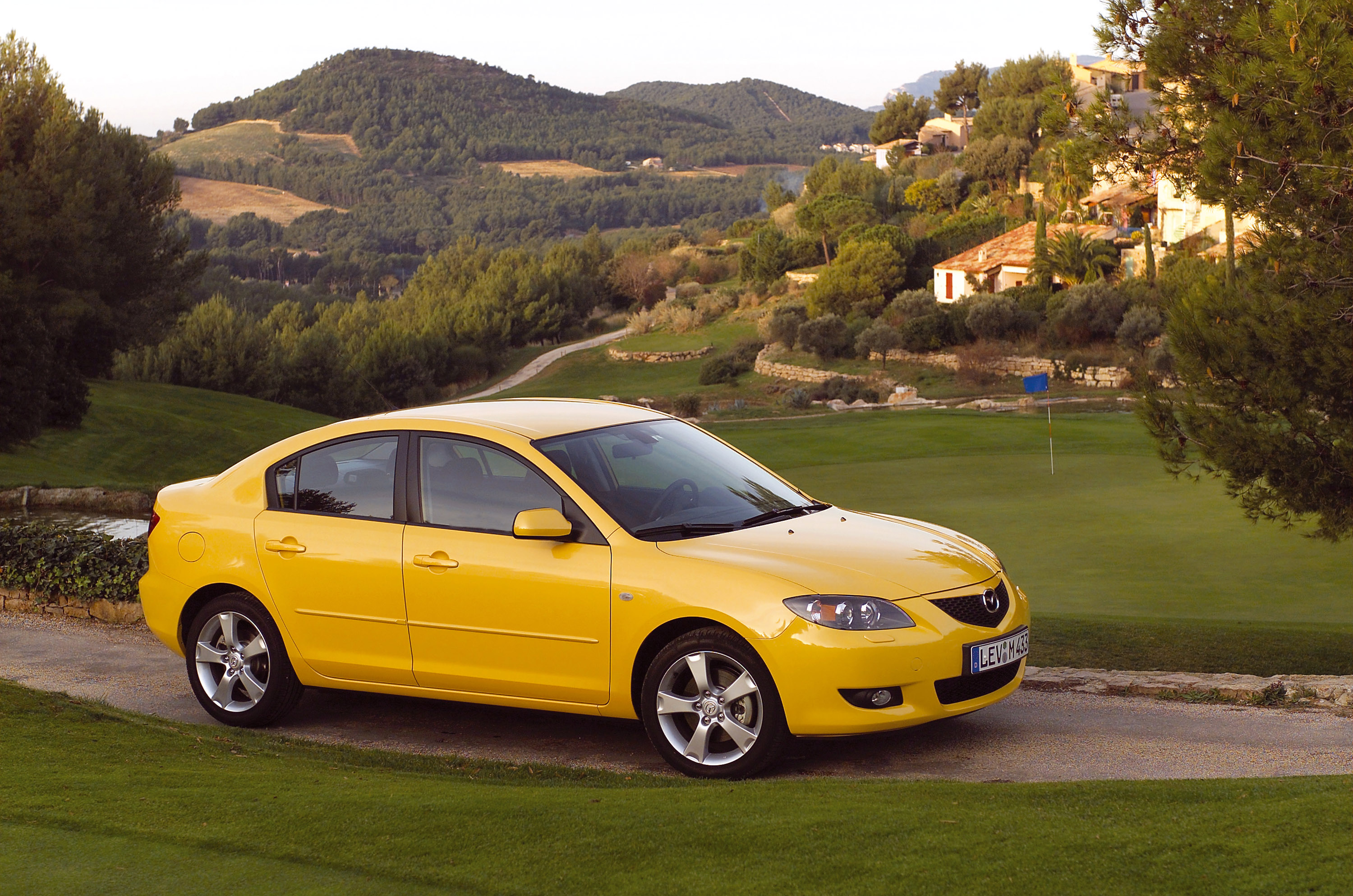 Mazda желтая. Mazda 3 BK. Мазда 3 2007 желтая седан. Mazda 3 BK седан. Мазда 3 2008 жёлтая.