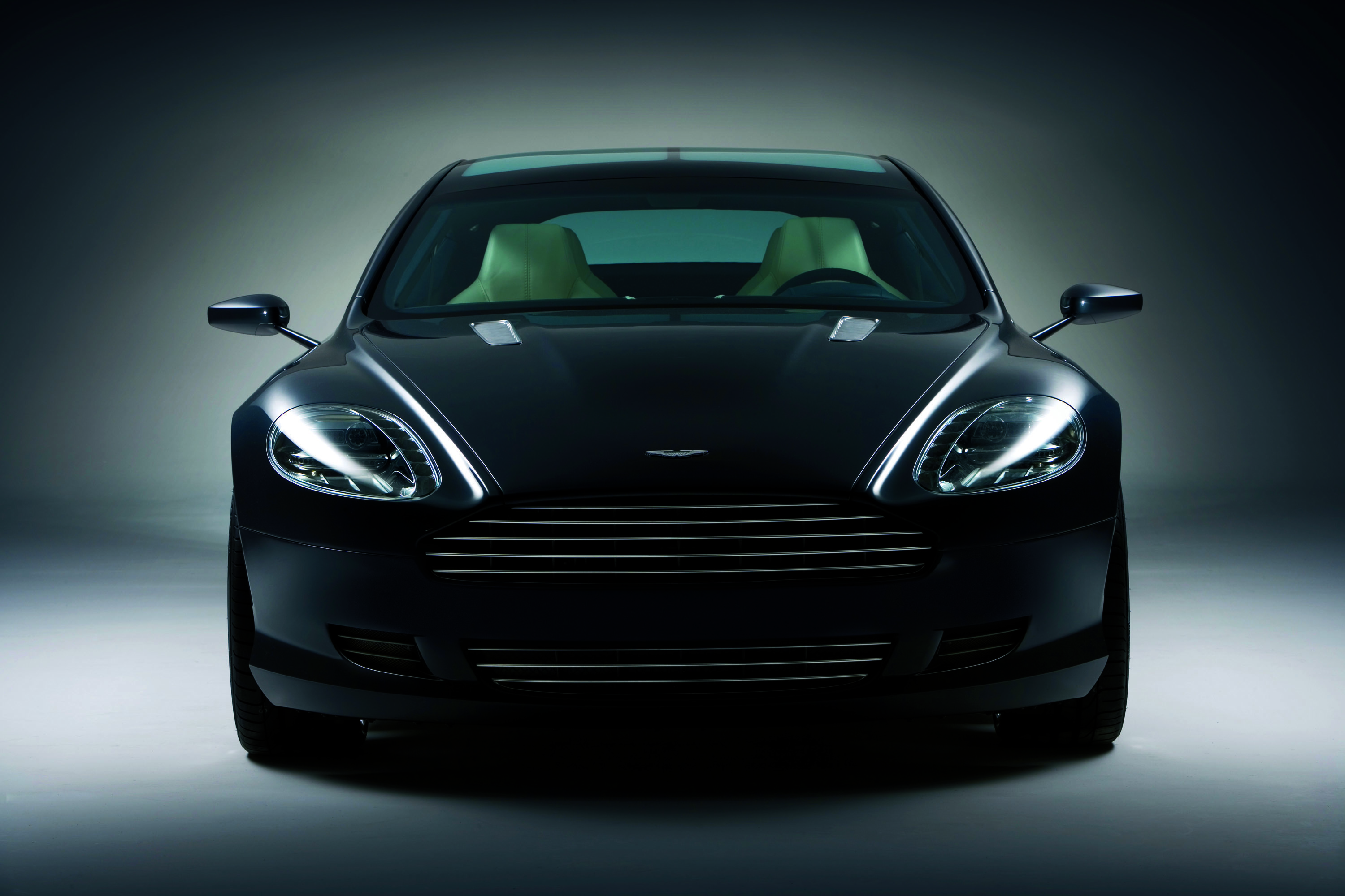 Черная машина перед. Aston Martin rapide Concept.