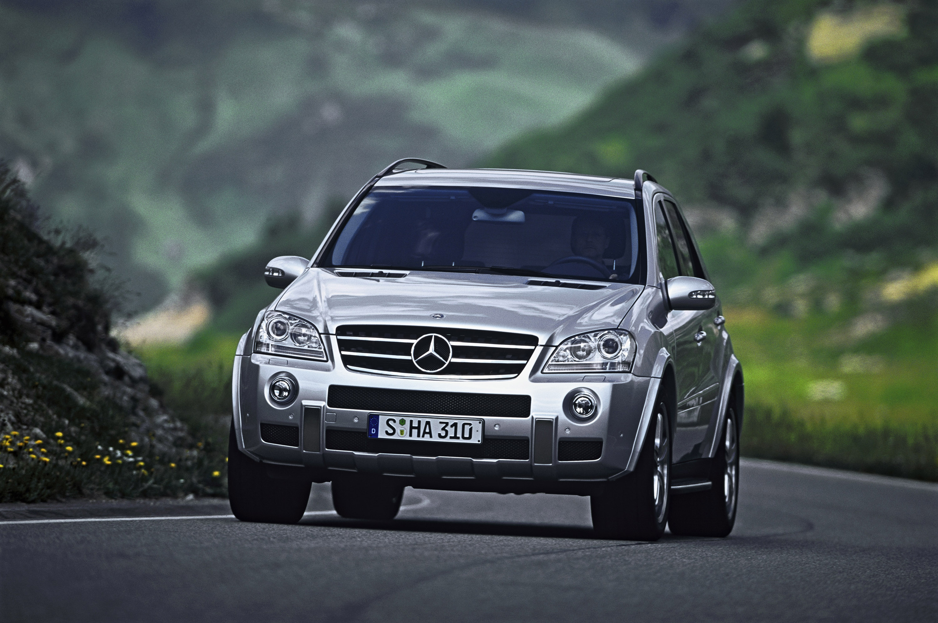 Ml 45 l. Mercedes-Benz w164. Mercedes Benz ml 63. Mercedes ml 63 AMG. W164 Mercedes.