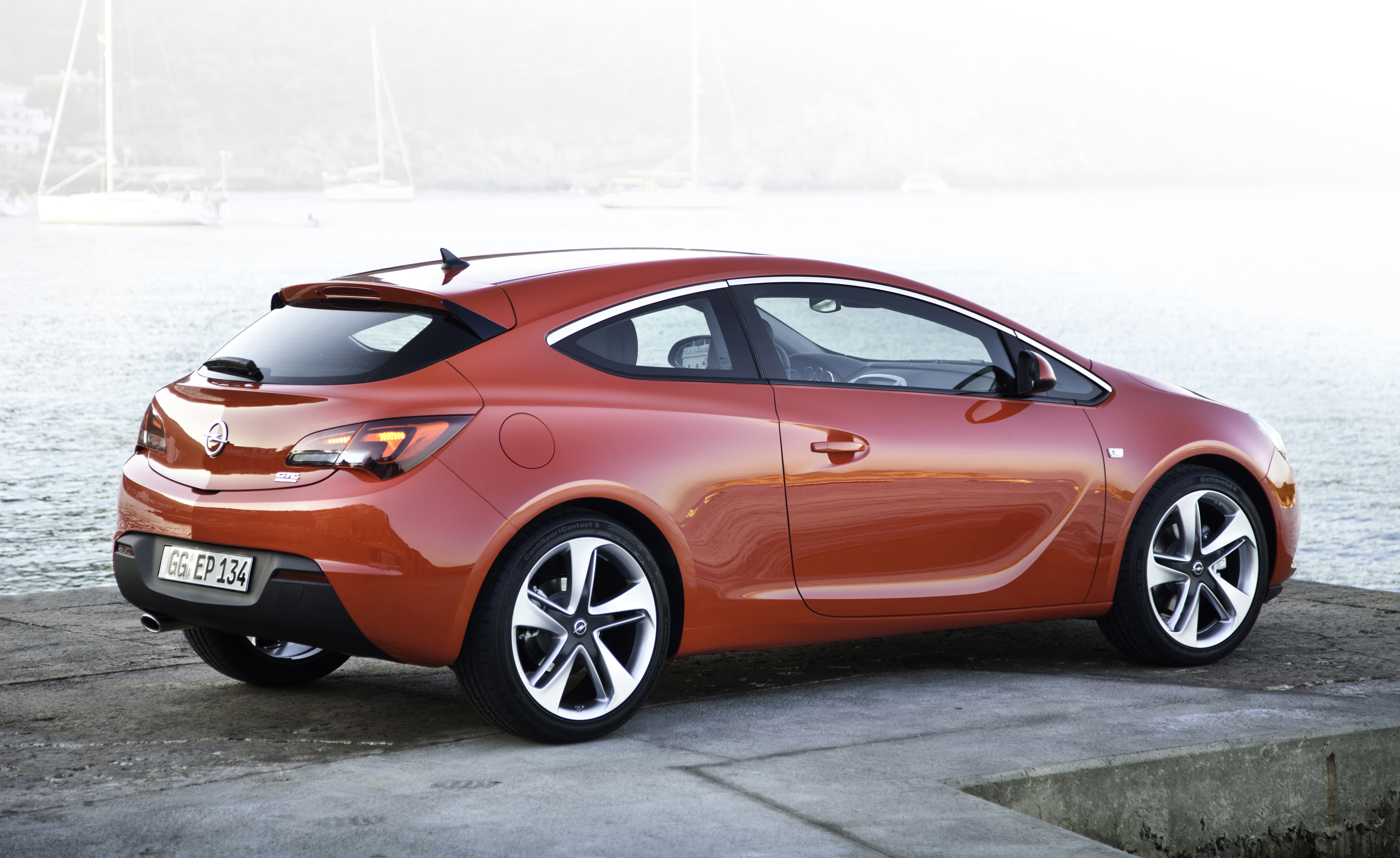 Опель джтс. Opel Astra GTC 2014. Opel Astra GTC 2012. Opel Astra GTC 2018. Opel Astra GTC 2011.